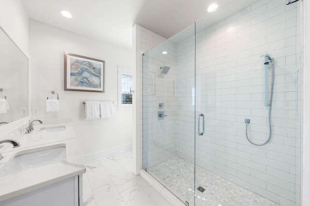 bathroom featuring vanity and a shower with shower door