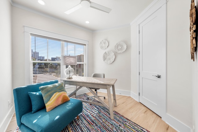 office area with ceiling fan, light hardwood / wood-style floors, and ornamental molding