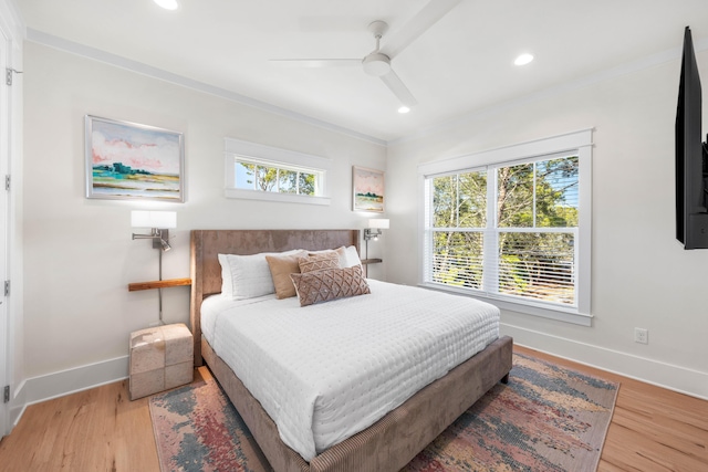 bedroom featuring ceiling fan and light hardwood / wood-style flooring