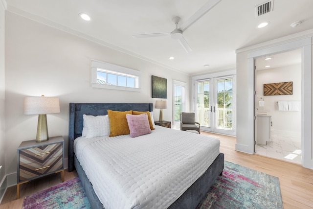 bedroom with french doors, crown molding, ensuite bath, ceiling fan, and access to exterior