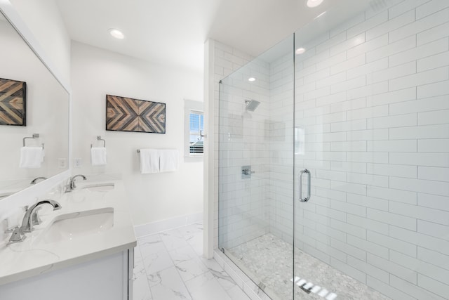 bathroom with vanity and walk in shower