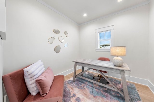 office featuring wood-type flooring and ornamental molding