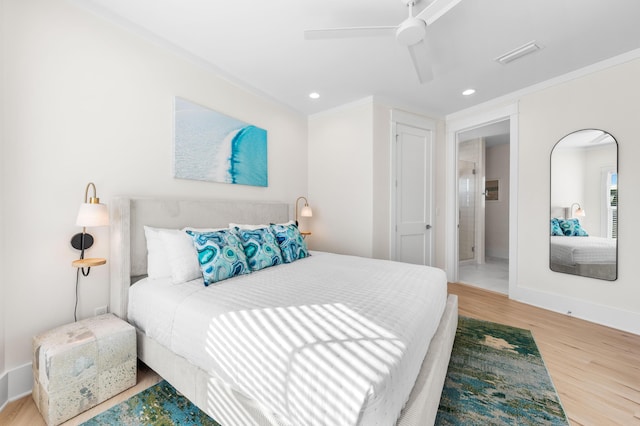 bedroom with light wood-type flooring, ceiling fan, and crown molding