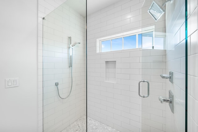 bathroom with an enclosed shower