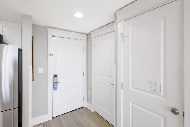 doorway to outside featuring light hardwood / wood-style flooring