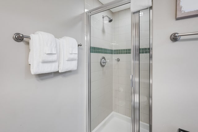 bathroom with an enclosed shower