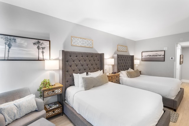 bedroom featuring light wood-type flooring