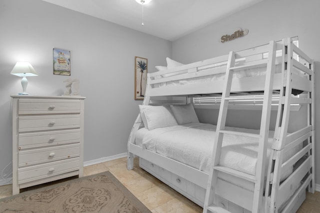 bedroom featuring light tile patterned flooring