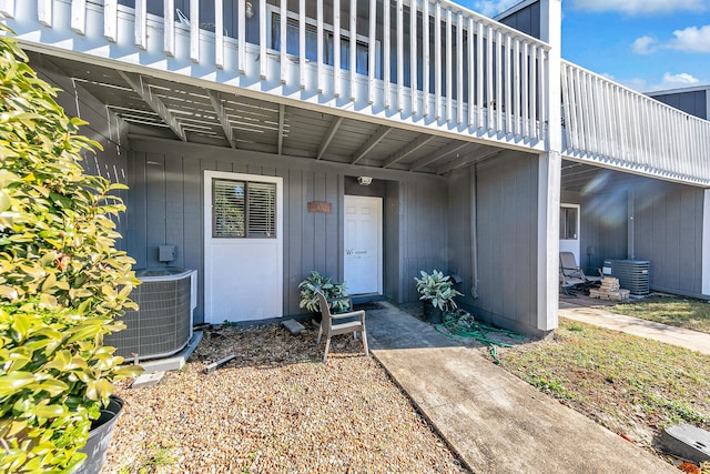 entrance to property featuring central AC unit