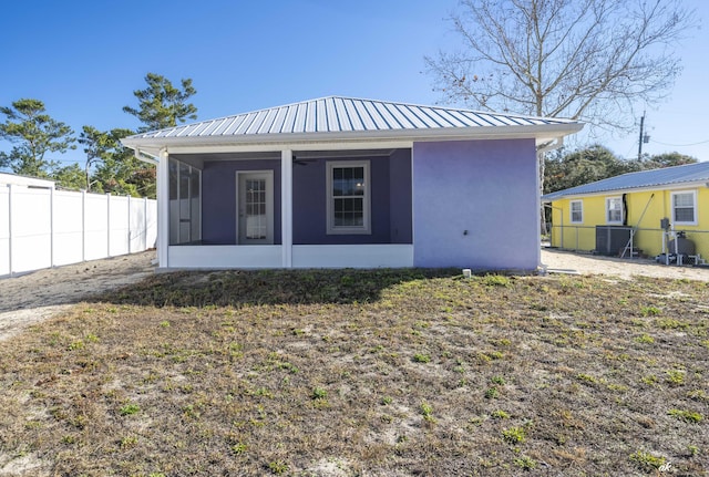 exterior space featuring a sunroom