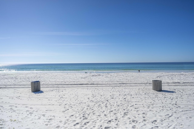 view of water feature with a beach view