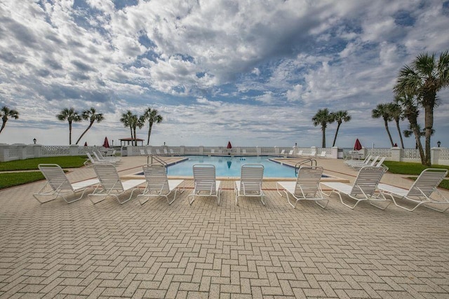 view of pool featuring a patio