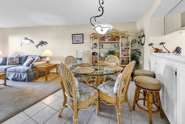 dining room with light tile patterned flooring