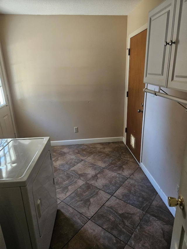 laundry room featuring washer / dryer