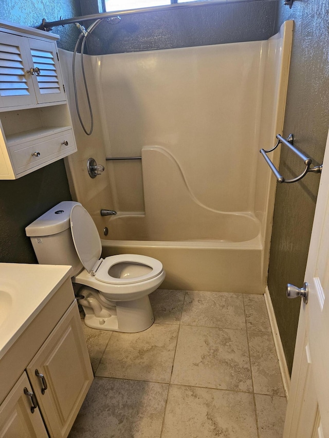 full bathroom with tile patterned floors, vanity, toilet, and shower / bathtub combination