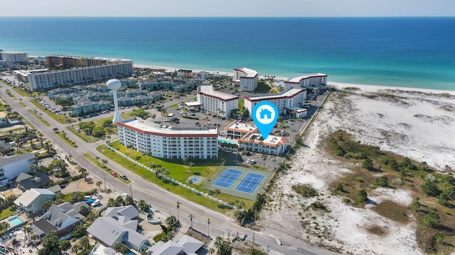 bird's eye view with a beach view and a water view