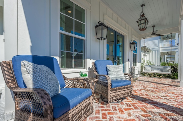 view of patio featuring a porch