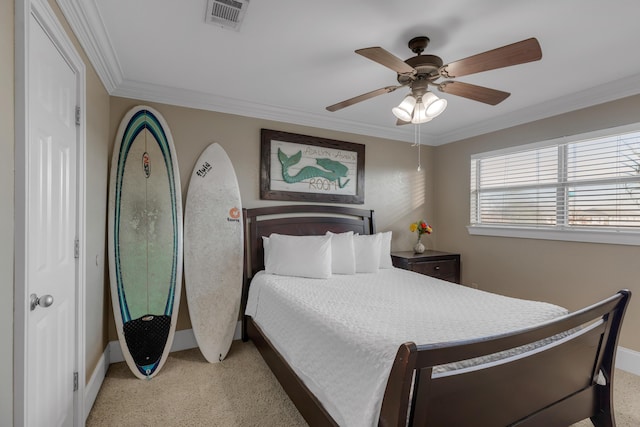 bedroom featuring ornamental molding and ceiling fan