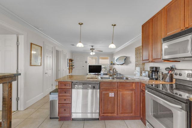 kitchen with sink, crown molding, stainless steel appliances, and light tile patterned floors