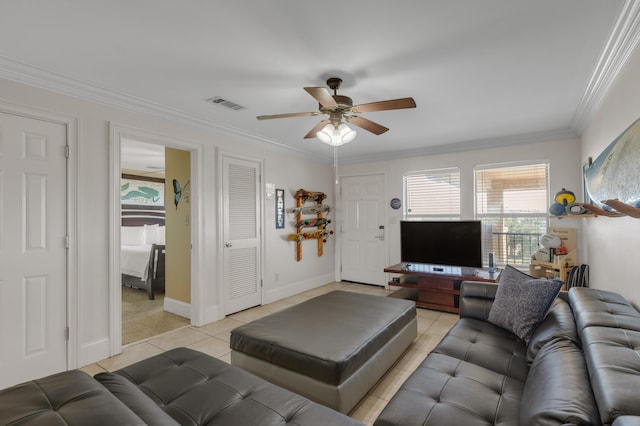 tiled living room featuring crown molding and ceiling fan