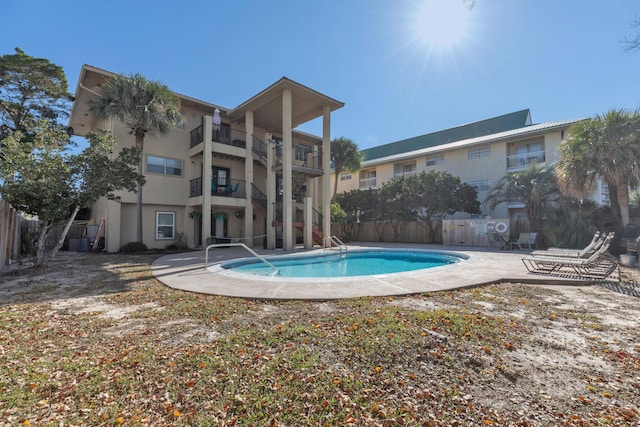 view of swimming pool featuring a patio