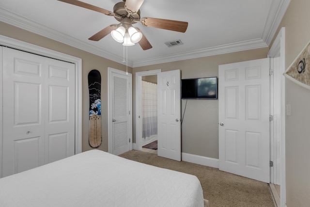 bedroom with crown molding, ceiling fan, and light colored carpet