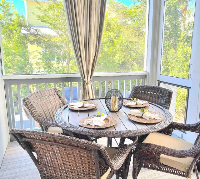 sunroom / solarium with a healthy amount of sunlight