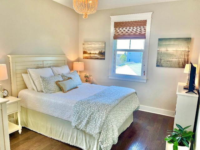 bedroom featuring dark hardwood / wood-style flooring