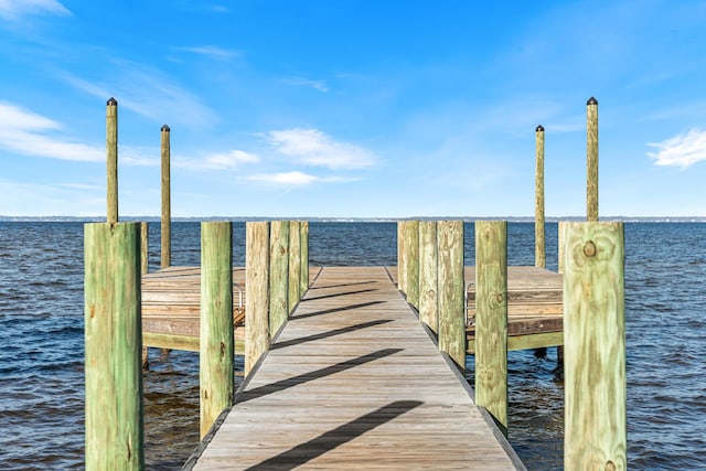 view of dock with a water view