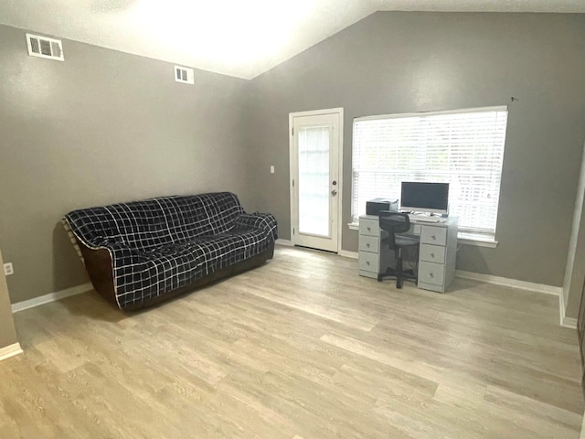 1501 N Partin Dr Unit 209, Niceville, FL 32578 - office featuring light hardwood / wood-style floors and vaulted ceiling
