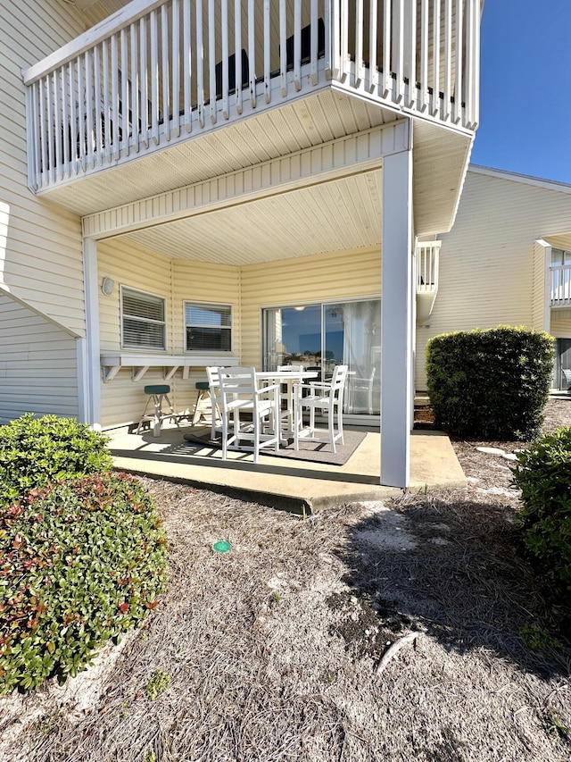 view of patio / terrace with a balcony