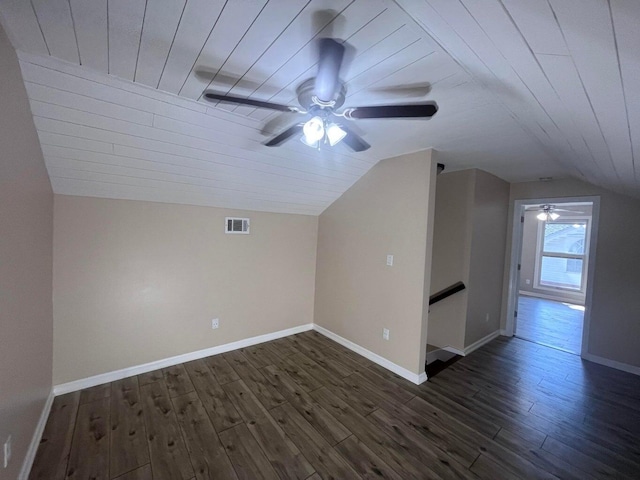 additional living space featuring dark hardwood / wood-style flooring, wooden ceiling, and vaulted ceiling