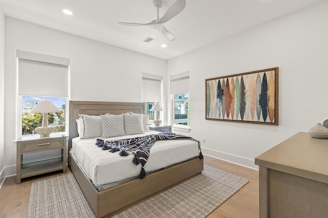 bedroom featuring ceiling fan and light wood-type flooring