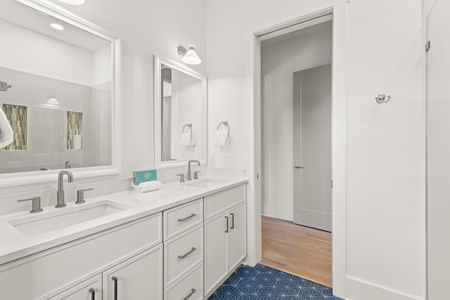 bathroom featuring vanity and hardwood / wood-style floors