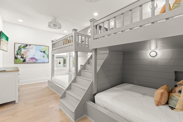 bedroom with light hardwood / wood-style flooring