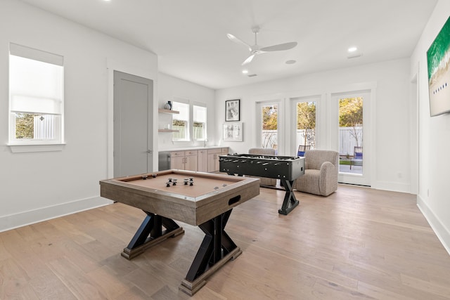 recreation room with ceiling fan, plenty of natural light, pool table, and light hardwood / wood-style floors