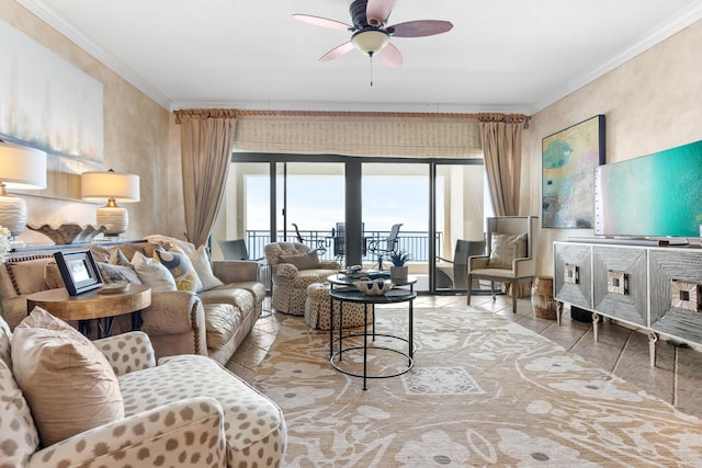 living room with ceiling fan and ornamental molding