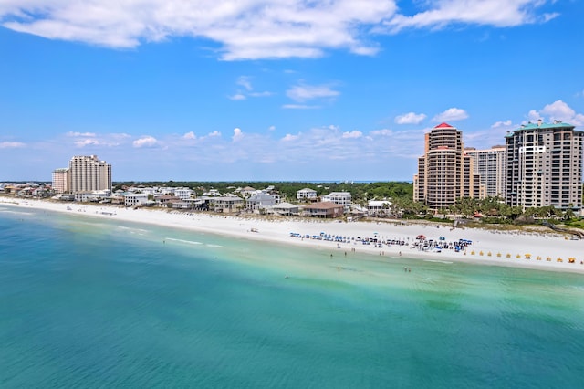 bird's eye view featuring a beach view and a water view