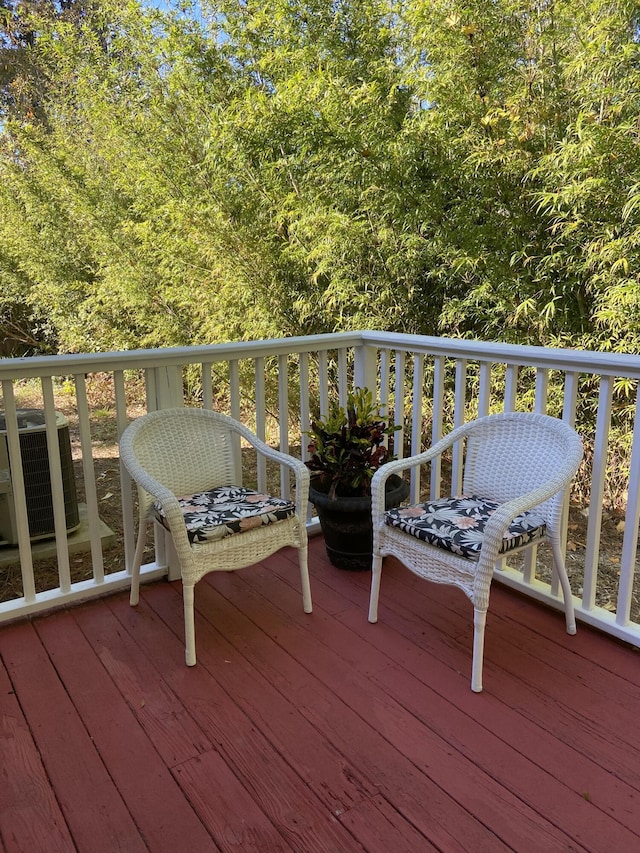 wooden deck featuring central AC