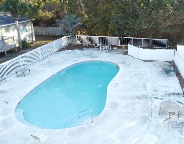 view of pool featuring a patio area