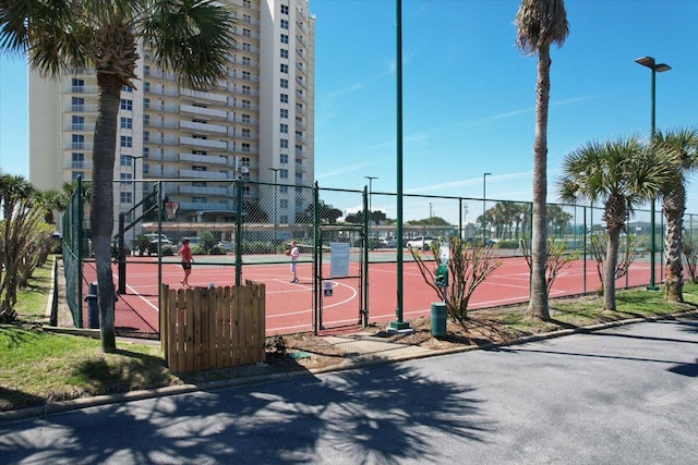 exterior space featuring basketball hoop