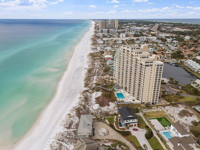 aerial view featuring a water view and a beach view