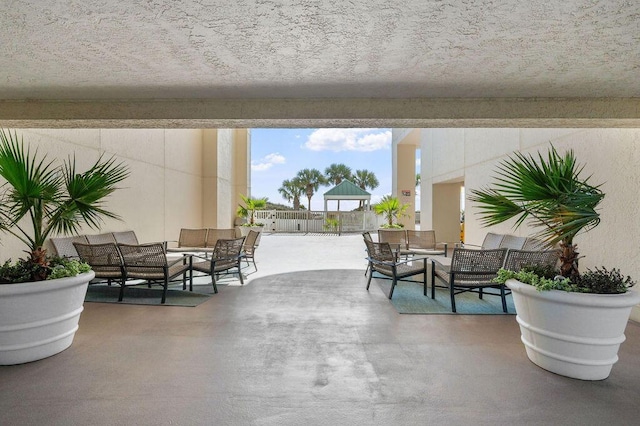 9815 US Highway 98 W Unit 1602, Miramar Beach, FL 32550 - view of patio with an outdoor living space and a gazebo