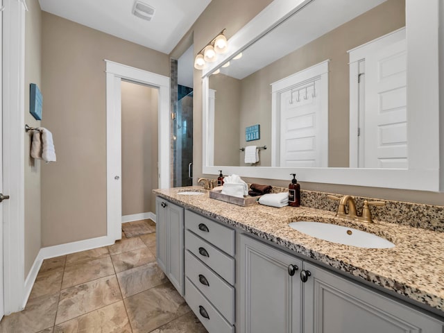 bathroom with vanity and walk in shower