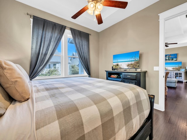 bedroom with wood-type flooring and ceiling fan