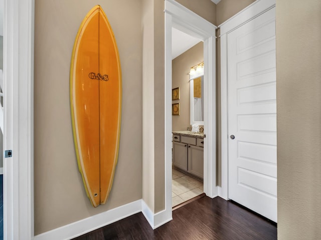 hallway featuring dark wood-type flooring