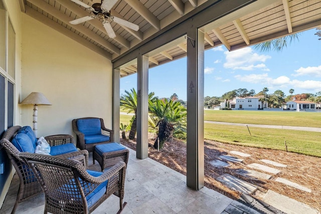 view of patio / terrace featuring ceiling fan