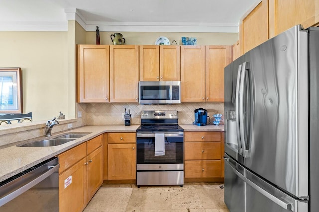 kitchen featuring backsplash, sink, stainless steel appliances, and light brown cabinets