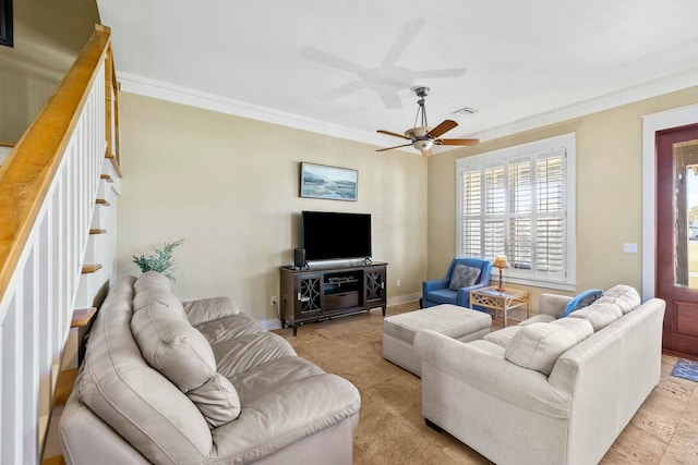 living room with ceiling fan and crown molding