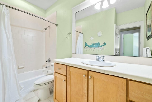 full bathroom featuring tile patterned flooring, shower / bath combo, vanity, and toilet